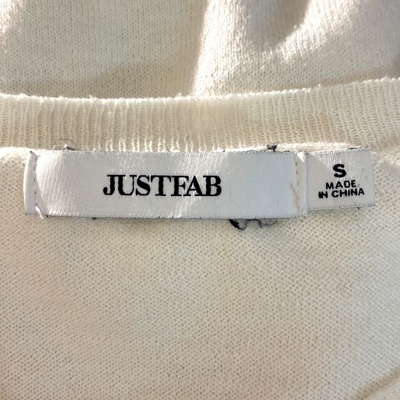 JustFab creamy white sweater top with unique open sleeves tie at the elbows - Picture 4 of 6